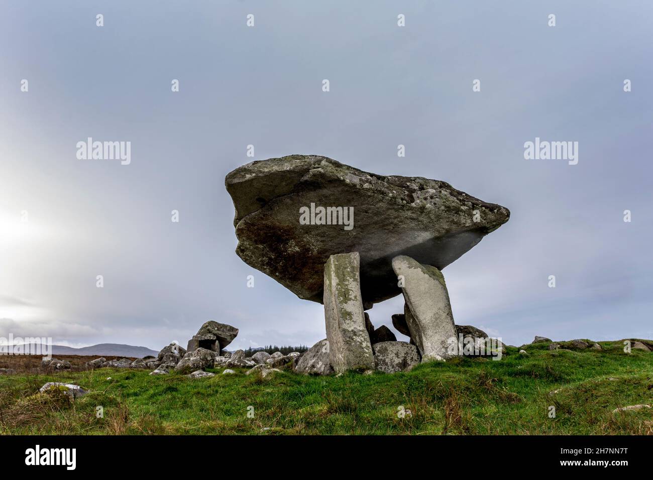 The Kilclooney Dolmen  fine portal-tome or dolmen, prominent on the skyline north-west of Ardara in County Donegal, Ireland. 3500 years old. Stock Photo