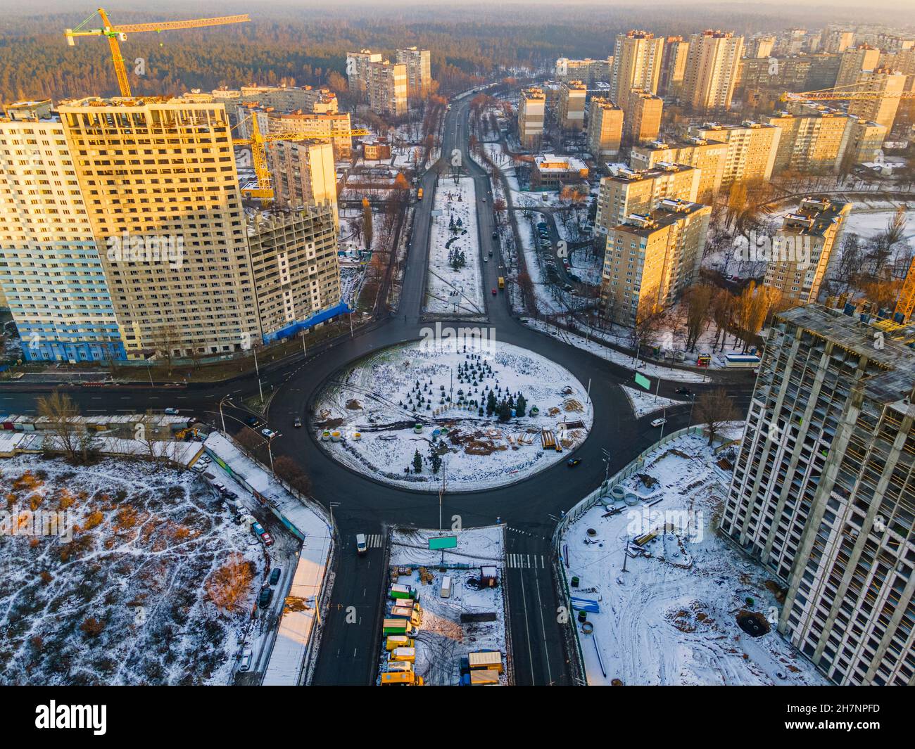 Aerial photo of Kyiv city districts in winter. Real estate houses and