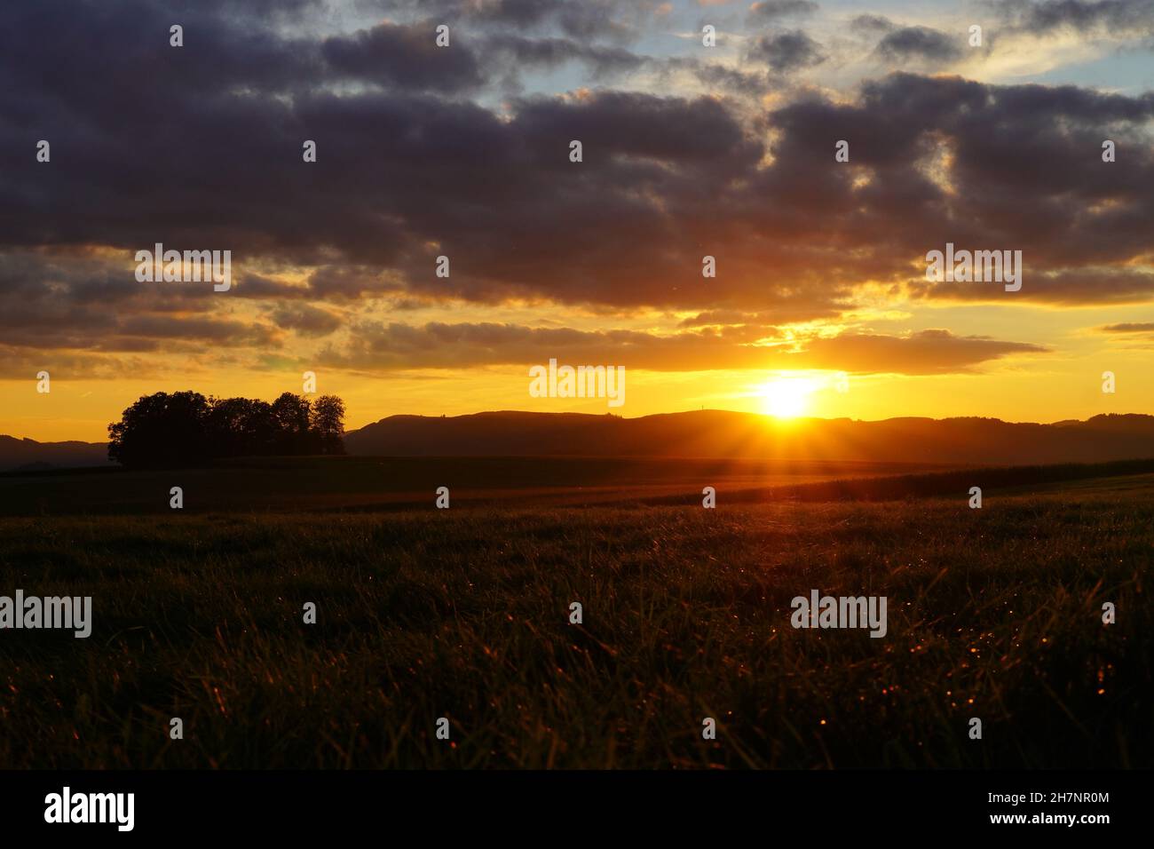 Sunset in the Sauerland. Landscape with setting sun in the evening. Stock Photo
