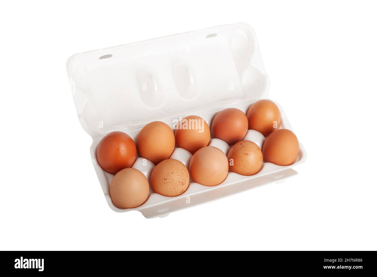 Large red rural eggs in a plastic patch isolated on white background Stock Photo