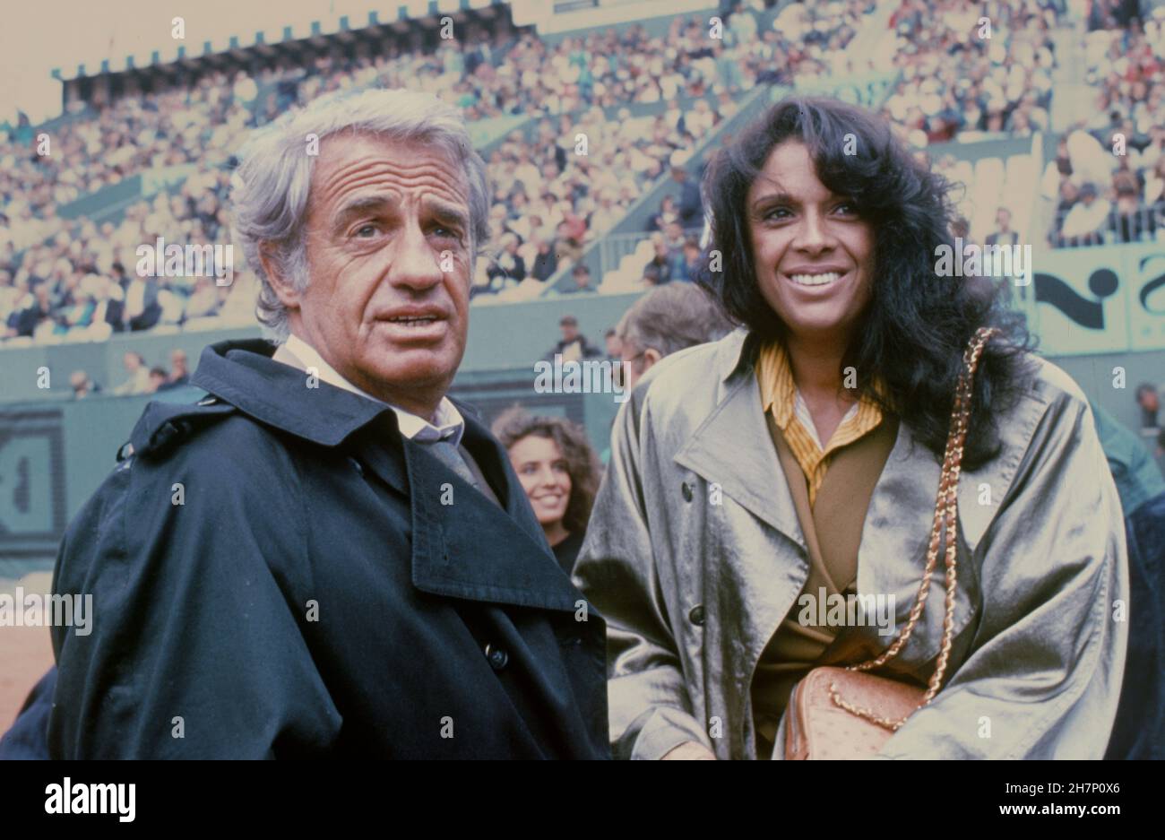 Jean-Paul Belmondo and Carlos Sotto Mayor attending a match in the stands of the French Open. Roland Garros, Paris, June 6, 1989 Stock Photo