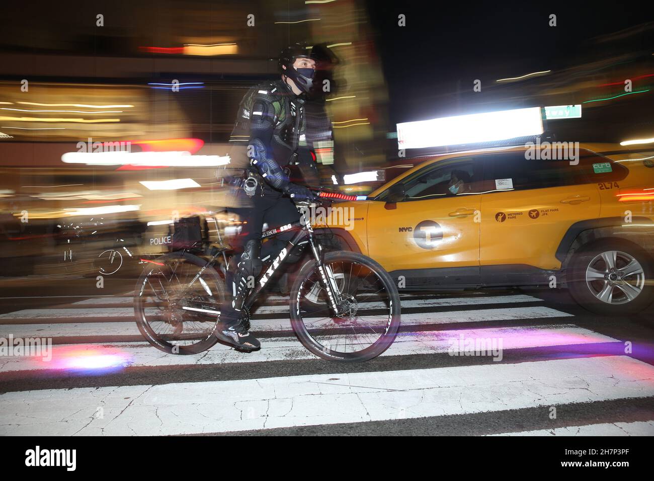 New York, NY, USA, NYPD officer on a bike wearing a Yaffa uniform or