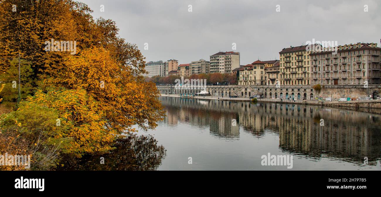 Beautiful panoramic of a colourful autumn day at Murazzi del Po, River Po in Turin (Torino), Piedmonte, Italy Stock Photo