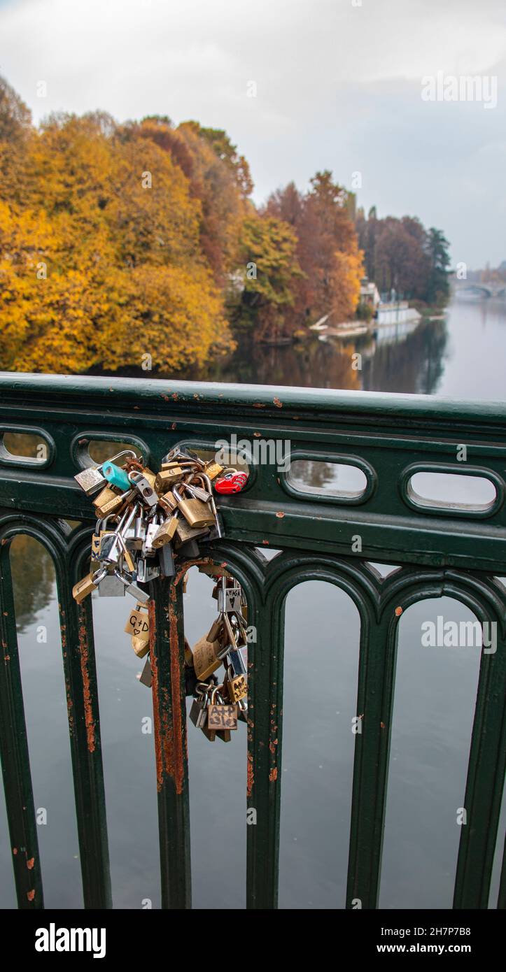The locks of love - padlocks on the Ponte Vittorio Emanuele I, over the River Po, Turin (Torino), Piedmonte, Italy Stock Photo