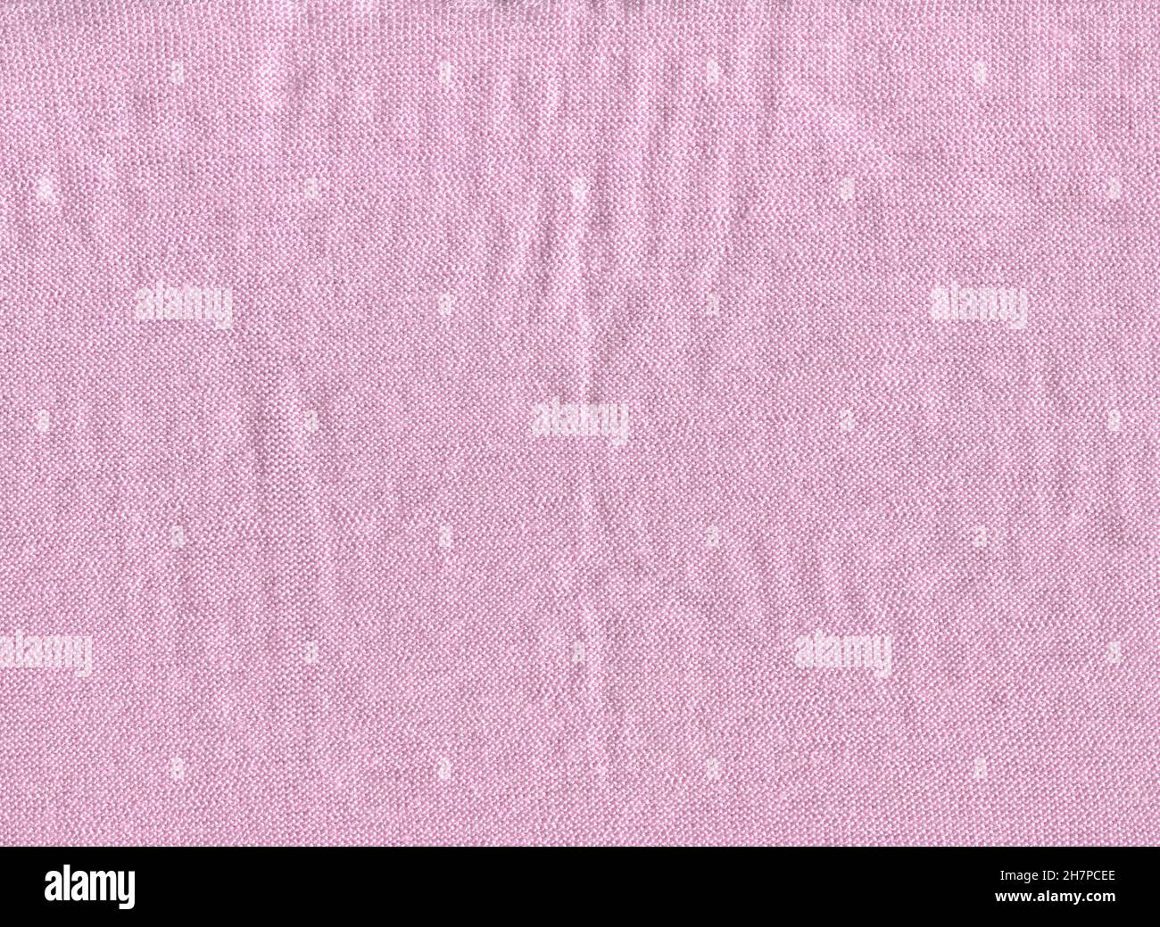 Winter pink simple fabric wool scarf pattern. Pink wool sweater texture. Stock Photo