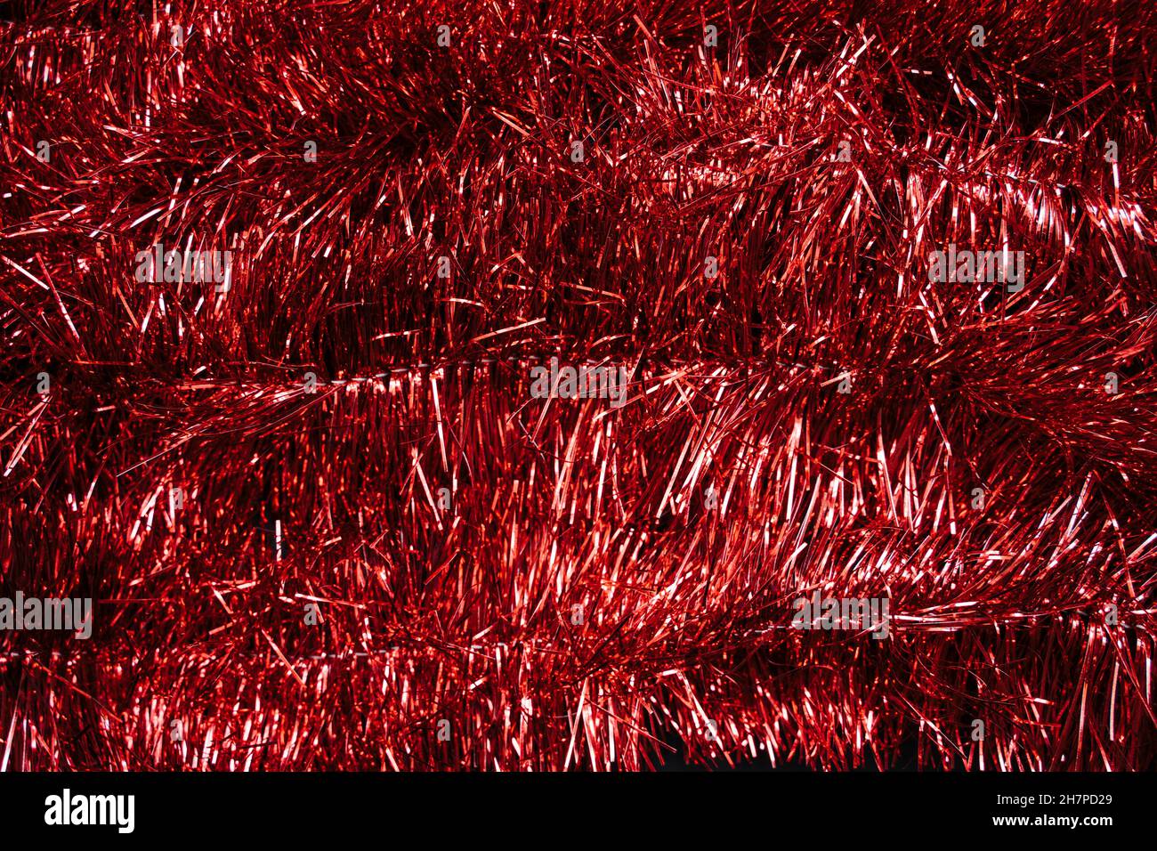 red tinsel background. Christmas holiday season backdrop banner Stock