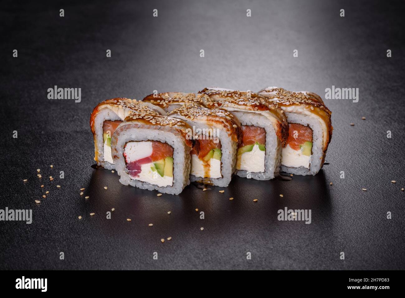 Sushi roll sushi with prawn, avocado, cream cheese, sesame. Sushi menu Stock Photo