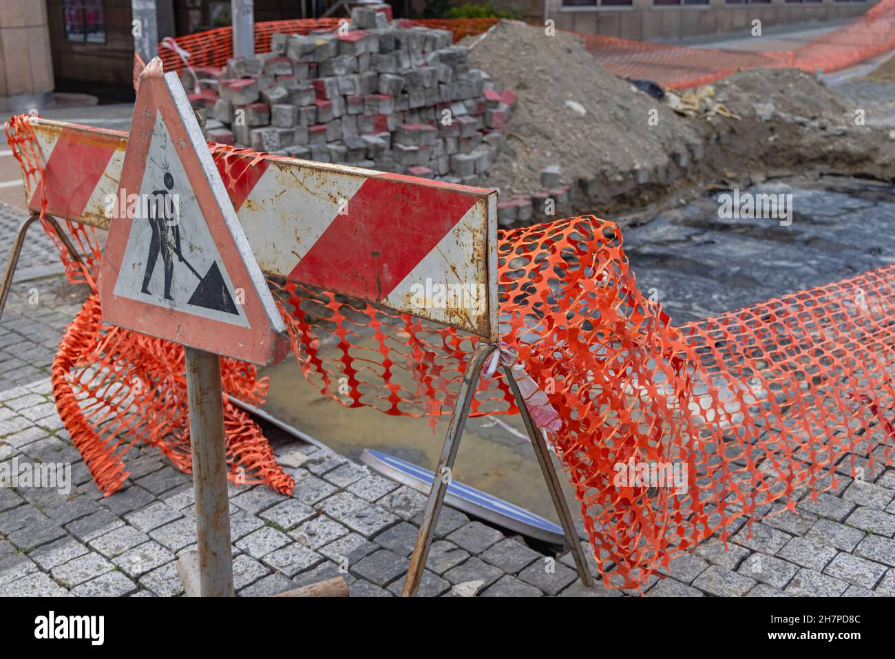 Road Works Sign Construction Barrier at City Street Stock Photo - Alamy