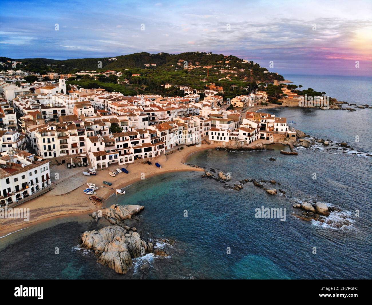 Calella de Palafrugell fishing harbor sunset aerial view in Spain. Town in Baix Emporda county of Catalonia, Spain. Stock Photo