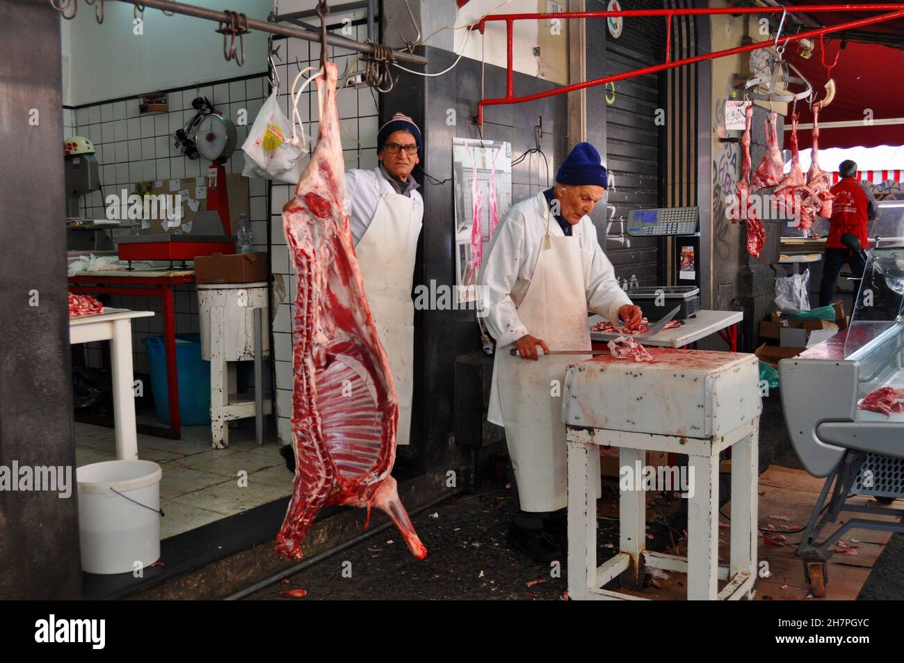 Catania - Sicily - Italy - Butchers at work. Stock Photo