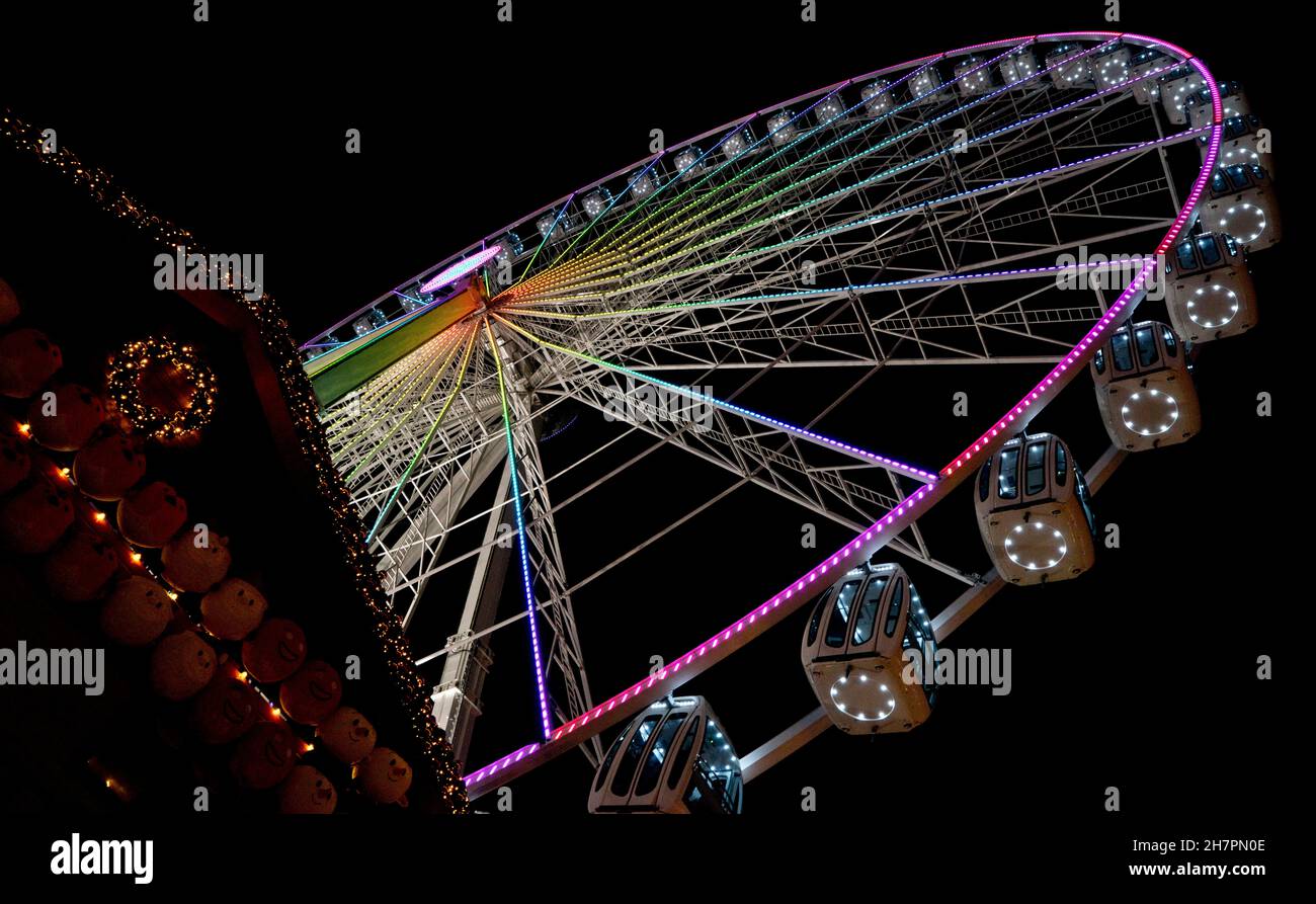 Visitors to the Hyde Park Winter Wonderland Christmas Fair, London