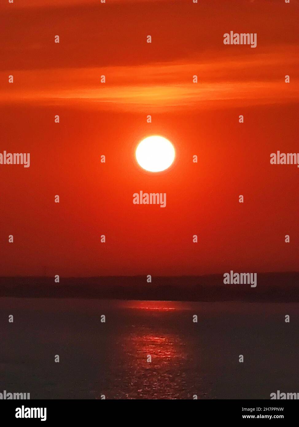 Beautiful bright orange sunset sky Stock Photo - Alamy