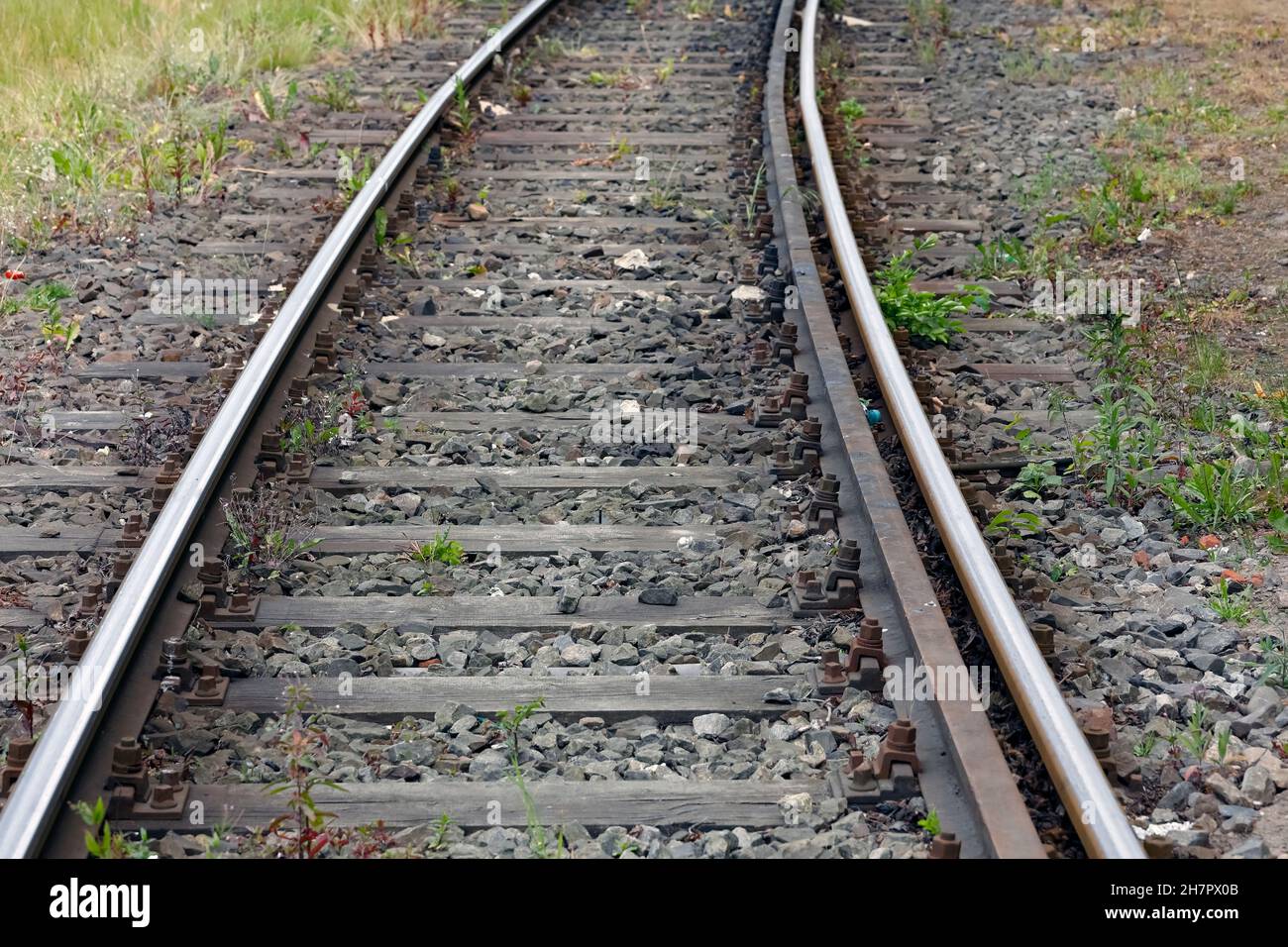 Rails laid on wooden sleepers in Poland in Kolobrzeg Stock Photo