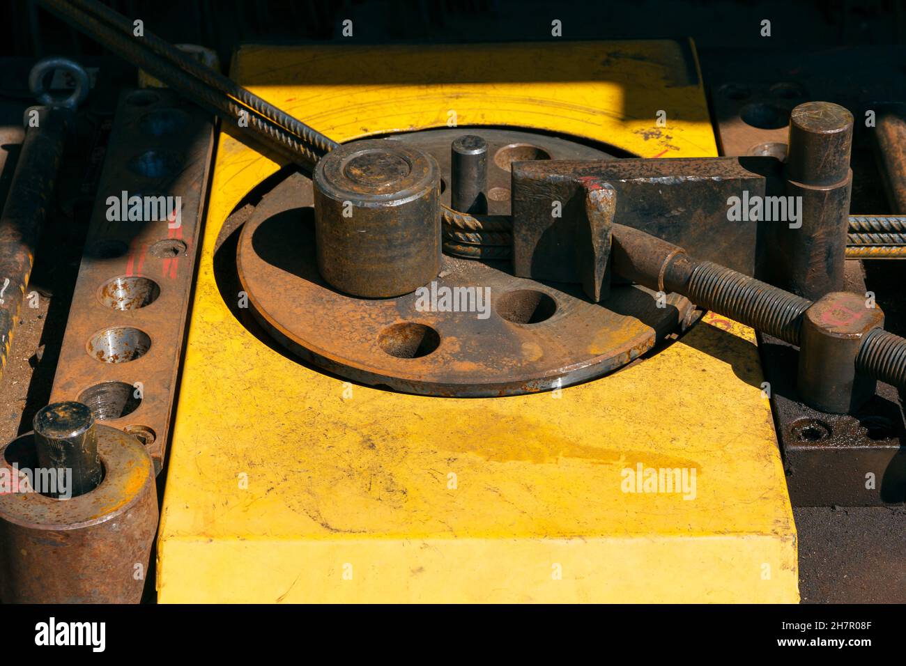 Rebars bending machine in the site. Preparation of parts from rebar