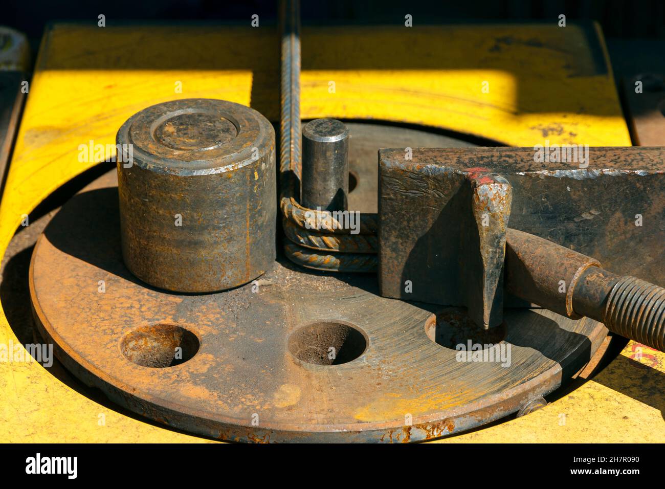 Rebars bending machine in the site. Preparation of parts from rebar