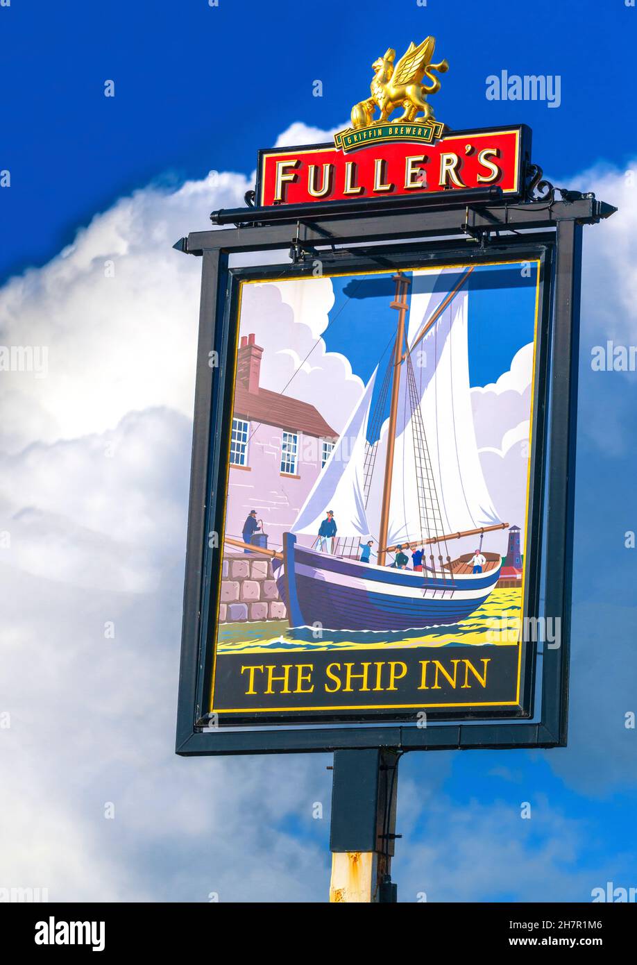 Op Art( abbreviation of optical art), with background clouds matching the sign clouds outside The Ship Inn a Fullers public house ,Langstone, Emsworth Stock Photo