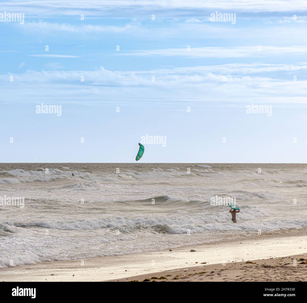 surfer and wind surf at Ditch Plains, Montauk, NY Stock Photo