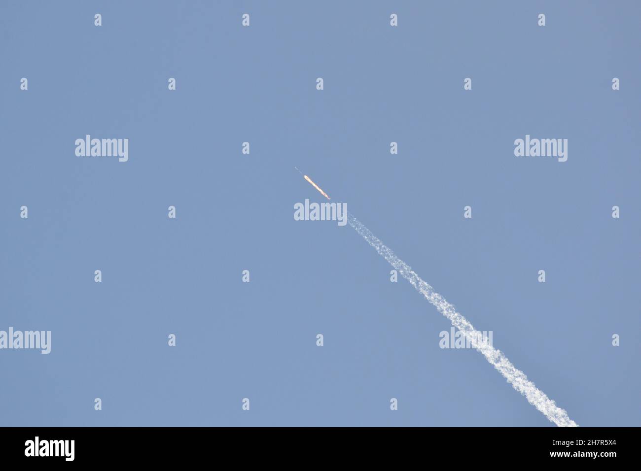 SpaceX's Falcon 9 rocket blasts off carrying Starlink satellites into orbit. Stock Photo