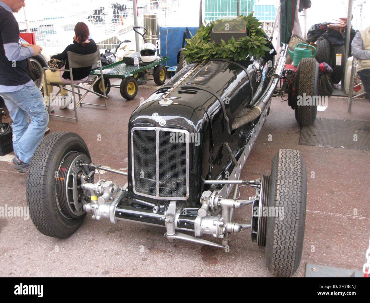 Julian Bronson's ERA R4D with the spoils of victory, at the 8th Monaco Historique race meeting May 2012. ERA's finished 1st, 2nd,3rd and 4th. Stock Photo