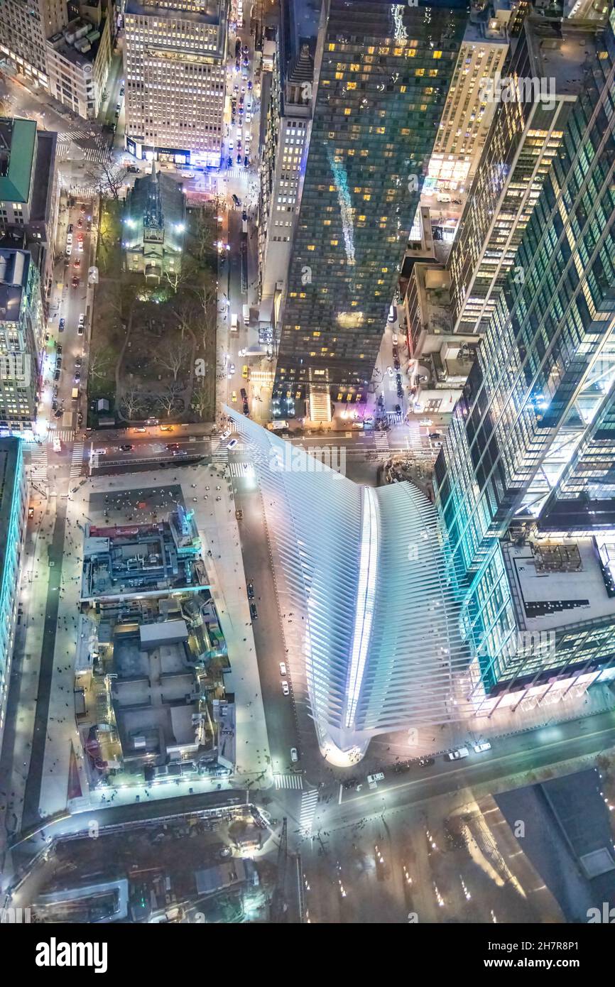 Overhead night aerial view of Downtown Manhattan buildings from a high