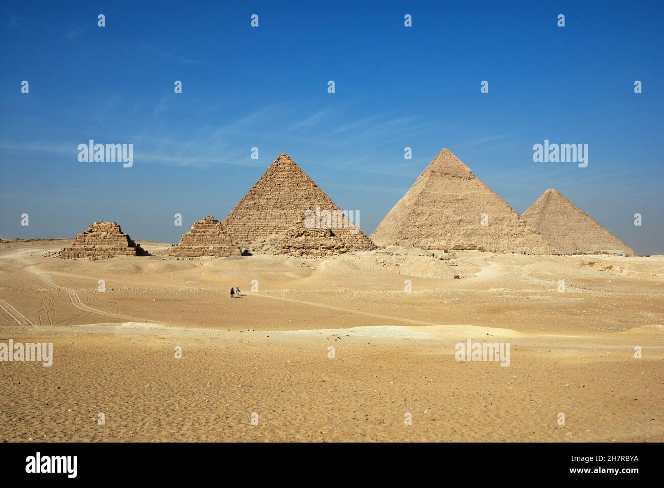 The Giza pyramid complex, also called the Giza Necropolis on the Giza Plateau in Egypt including the Great (Cheops) Pyramid of Giza, the Pyramid of Kh Stock Photo