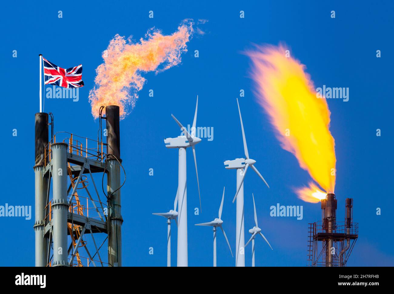 Chemical plant and coke oven gas flares with wind turbines. Fossil