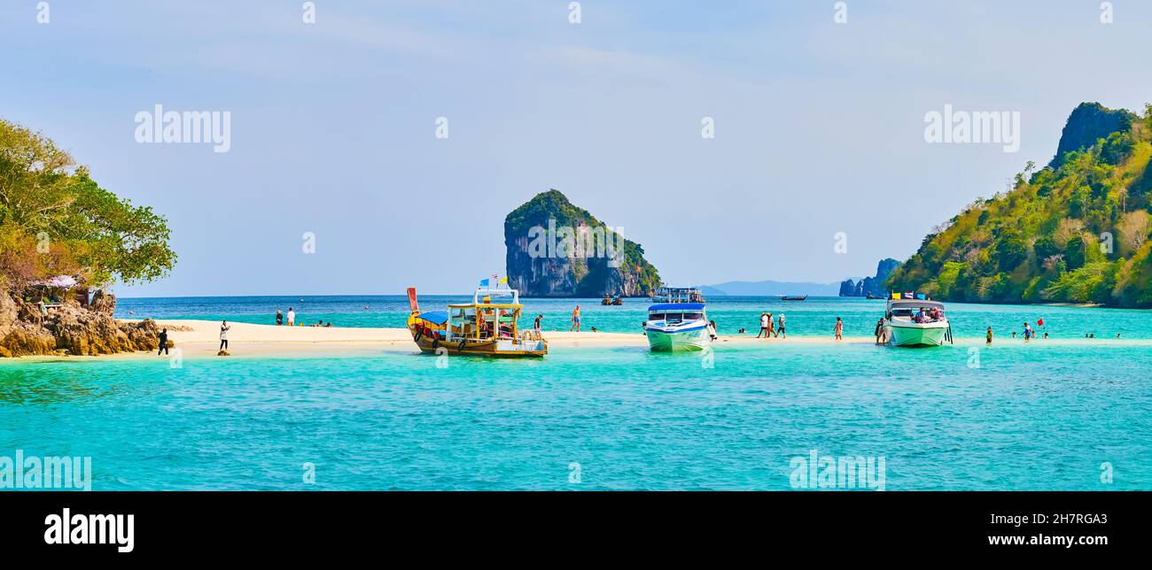 AO NANG, THAILAND - APRIL 26, 2019: Islands Koh Mor and Koh Tups with their sand spit are one of the most popular tourist destination of Krabi region, Stock Photo
