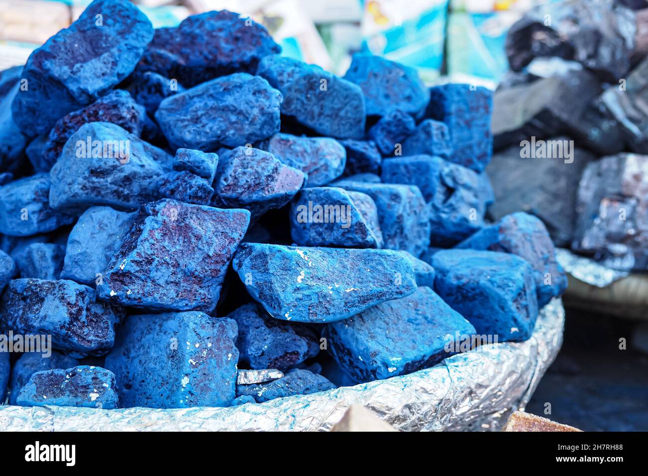 Blue indigo color stones displayed at traditional souk - street