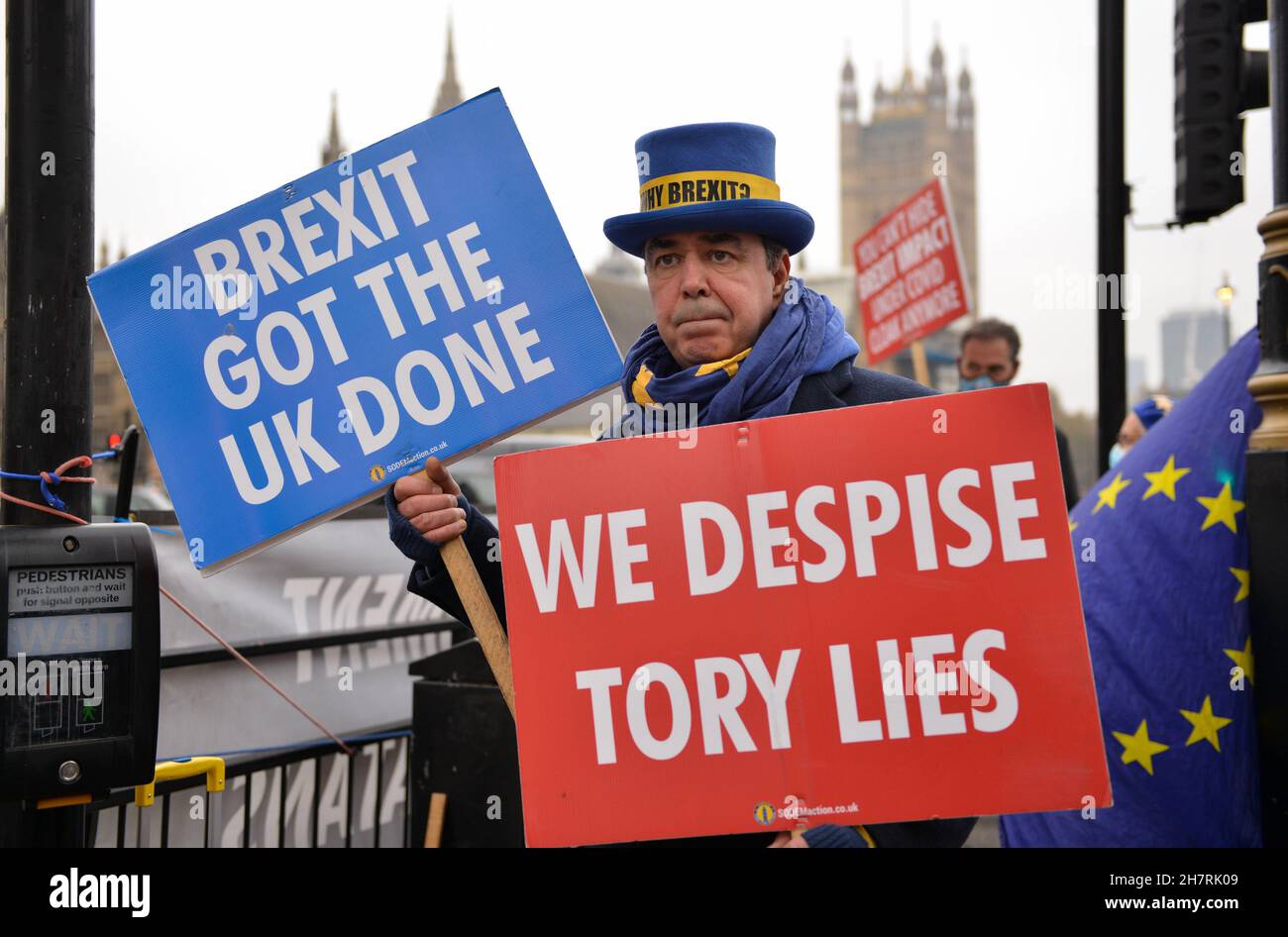 London, UK. 24th Nov, 2021. Steve Bray seen wearing a hat while holding placards expressing his opinion during the demonstration.Protesters from the group of Sodem Action lead by Pro EU activist Steve Bray staged a protest at the Parliament Square. (Photo by Thomas Krych/SOPA Images/Sipa USA) Credit: Sipa USA/Alamy Live News Stock Photo