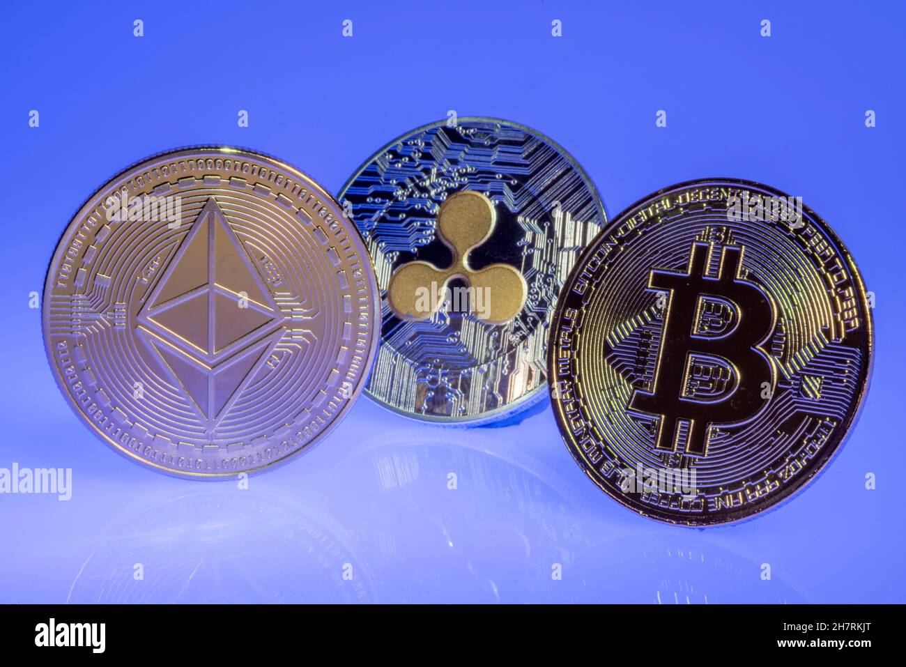 Various cryptocurrencies, symbol coins, optical placeholder for the digital  currency, blockchain, Bitcoin, Ripple, Ethereum, from right to left Stock  Photo - Alamy