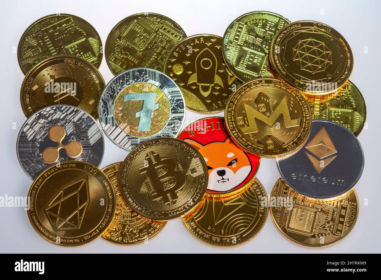 Various cryptocurrencies, symbol coins, optical placeholder for digital currency, blockchain, Bitcoin, Ripple, Ethereum, Shiba Inu, Eos, Litecoin, Mon Stock Photo