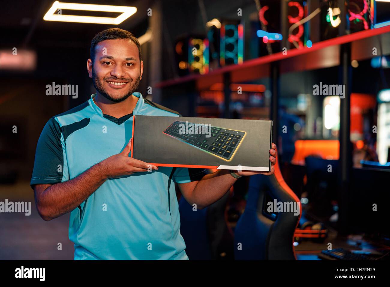 Esports gamer succeed in gaming tournament in computer club Stock Photo
