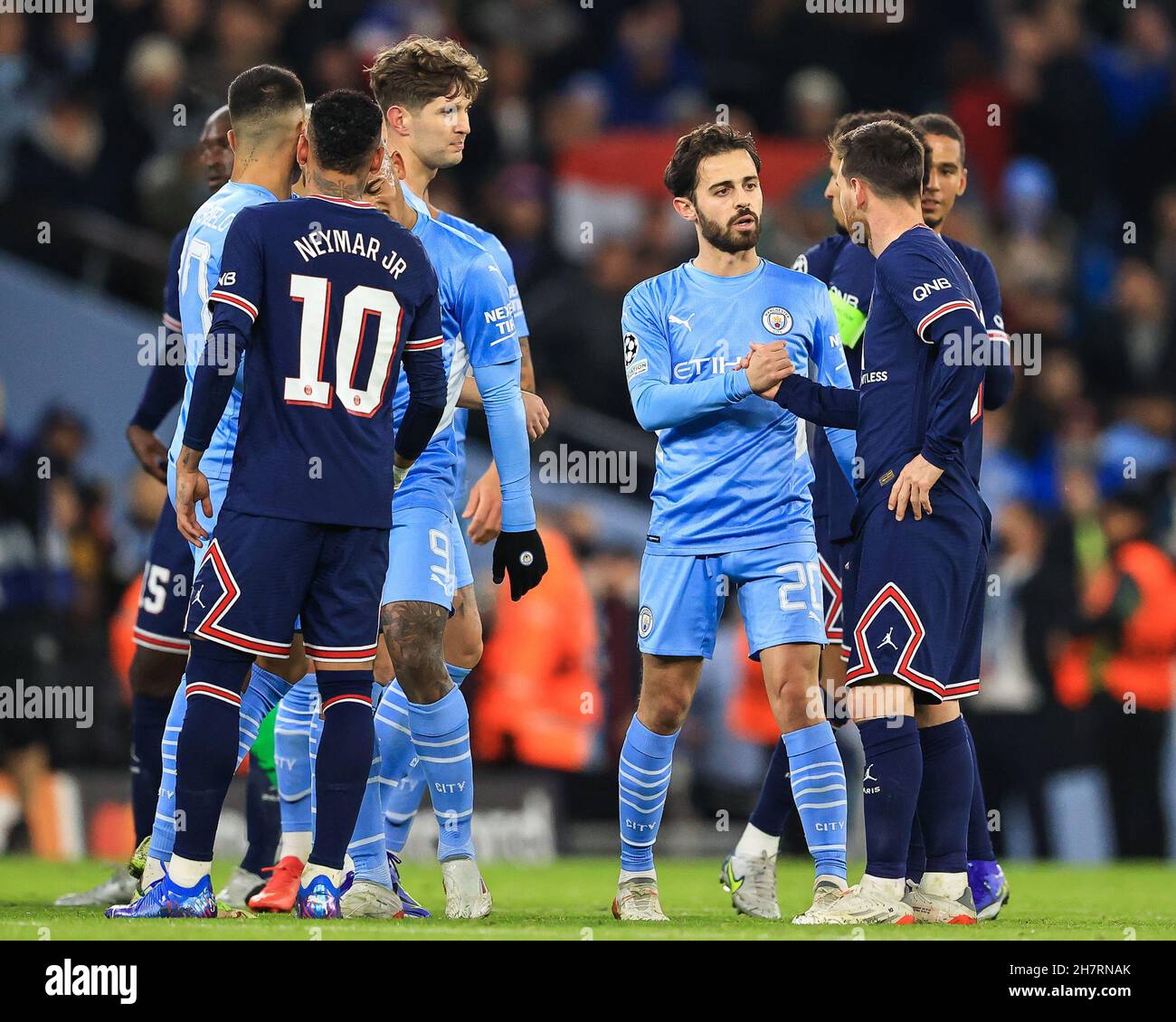 Bernardo Silva 20 of Manchester City shakes hands with Lionel Messi