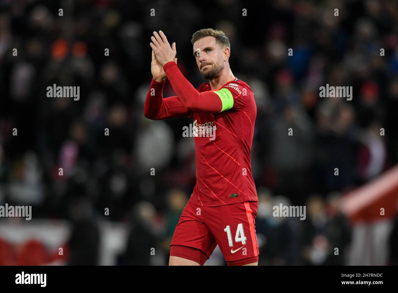 Liverpool, UK. 24th Nov, 2021. Jordan Henderson #14 of Liverpool applauds the home supporters at the end of the game after his side beat FC Porto 2-0 in Liverpool, United Kingdom on 11/24/2021. (Photo by Simon Whitehead/News Images/Sipa USA) Credit: Sipa USA/Alamy Live News Stock Photo