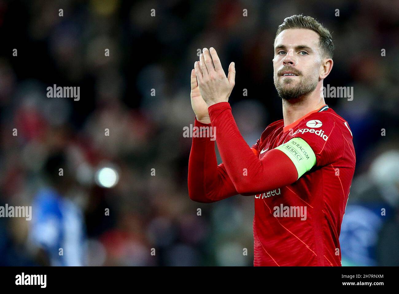 Liverpool, UK. 24th Nov, 2021. Jordan Henderson of Liverpool shows his appreciation to the fans at the end on the game. UEFA Champions league, group B match, Liverpool v Porto at Anfield Stadium in Liverpool on Wednesday 24th November 2021. this image may only be used for Editorial purposes. Editorial use only, license required for commercial use. No use in betting, games or a single club/league/player publications. pic by Chris Stading/Andrew Orchard sports photography/Alamy Live news Credit: Andrew Orchard sports photography/Alamy Live News Stock Photo