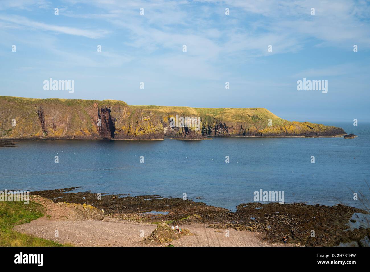 Dunnottar Castle across Old Hall Bay near Stonehaven, Aberdeenshire, Scotland, United Kingdom, Europe Stock Photo