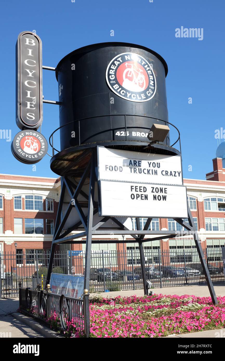 FARGO, NORTH DAKOTA - 4 OCT 2021: Sign and water tower at The Great Northern Bicycle Company, Downtown in the historic Great Northern Train Depot buil Stock Photo