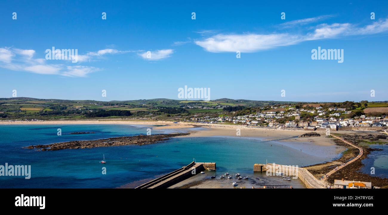 The stunning panoramic view from the castle at St. Michaels Mount in Cornwall, UK, overlooking St. Michaels Mount harbour , the causeway and the town Stock Photo