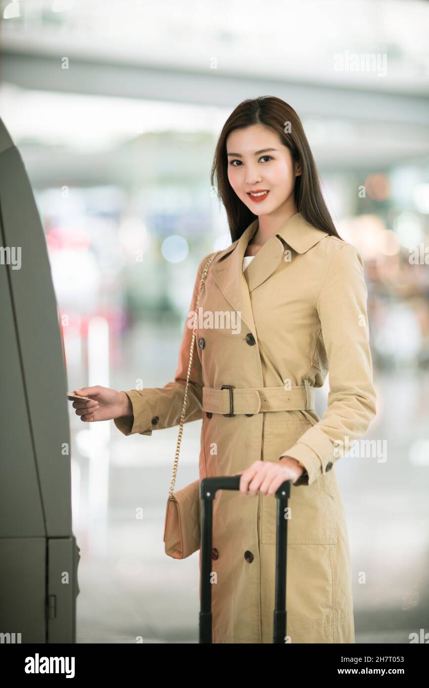 Woman suitcase using ticket hi-res stock photography and images - Alamy