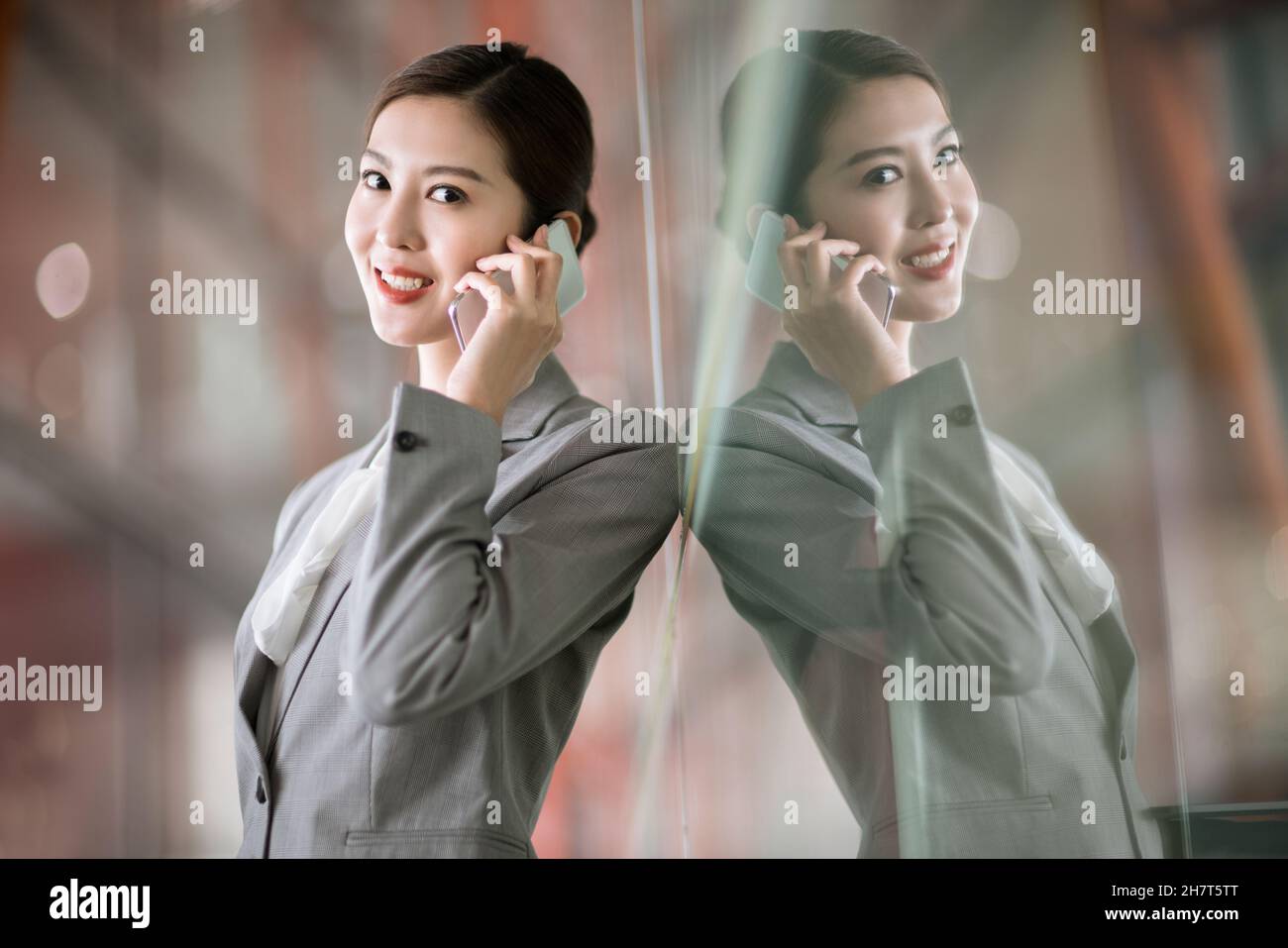 Woman standing in airport concourse hi-res stock photography and images ...