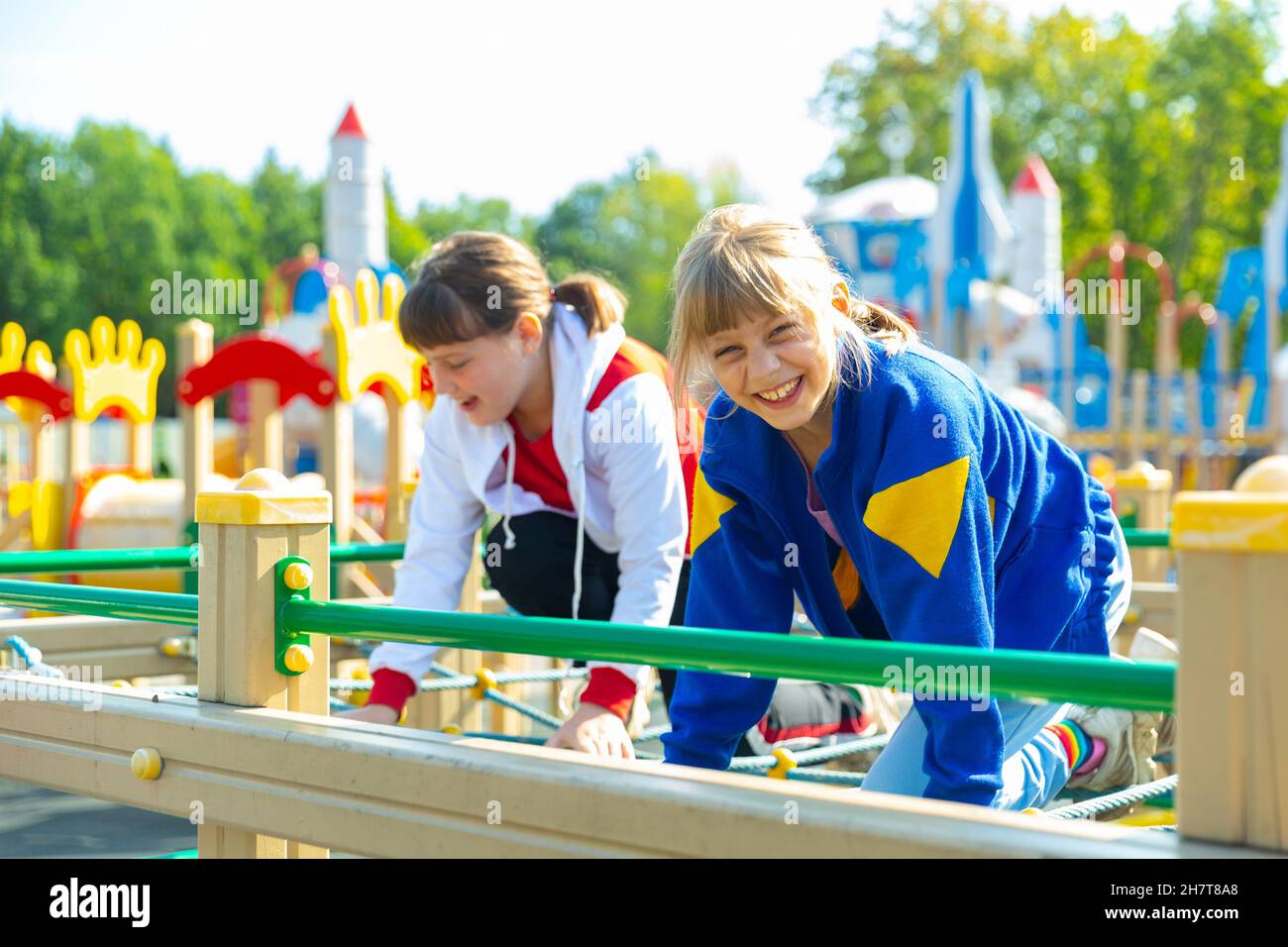 Portraits of two teenage girls on the playground Stock Photo - Alamy
