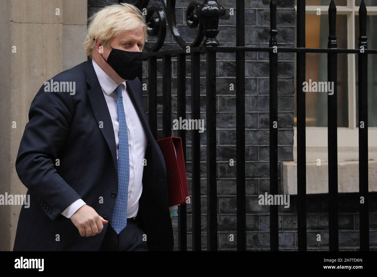 London, Britain. 24th Nov, 2021. British Prime Minister Boris Johnson leaves 10 Downing Street for the Prime Minister's Questions at the House of Commons in London, Britain, Nov. 24, 2021. Credit: Tim Ireland/Xinhua/Alamy Live News Stock Photo