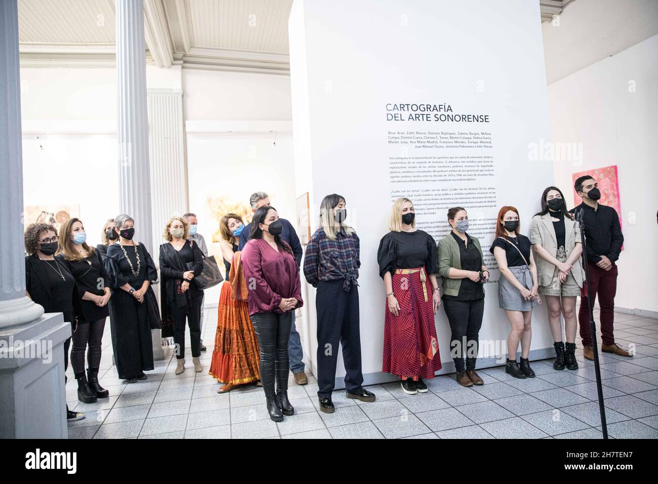 Several people, during the art and painting exhibition entitled "Cartographies of Sonoran Art