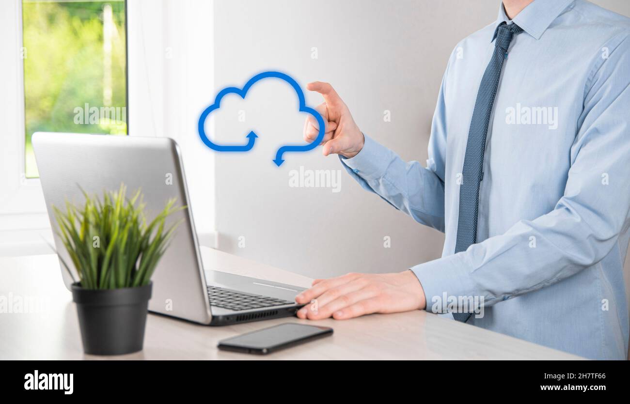 Business man holding icon cloud computing network and icon connection data information in hand. Cloud computing and technology concept Stock Photo