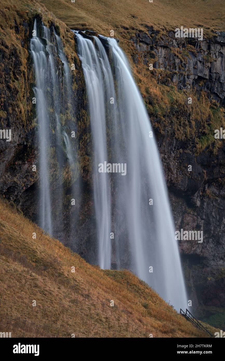 Seljalandfoss Waterfall in Iceland long exposure with hiking path Stock Photo