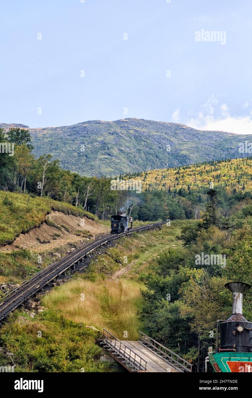 The cog train up Mount Washington is one of the steepest railways and the first (1869) mountain climbing railway in existence. Stock Photo