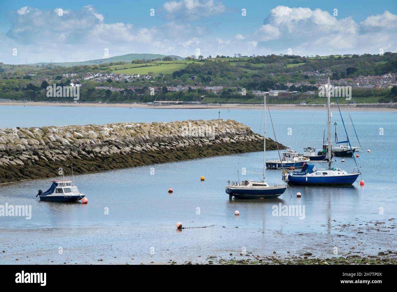 Rhos on Sea on the North Wales coast small secluded harbour with boat