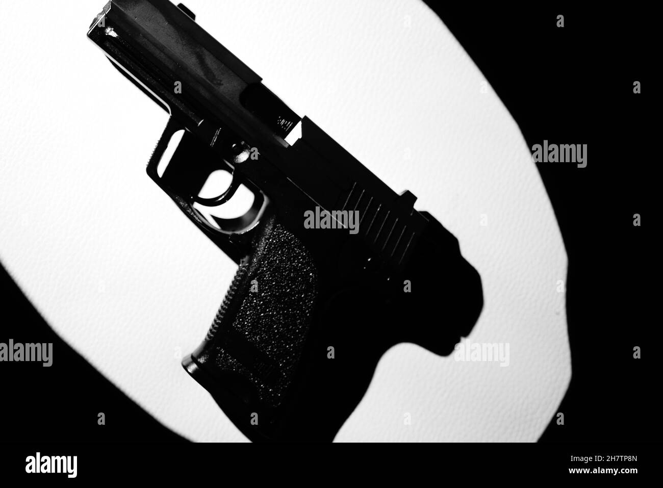 Automatic 9mm pistol gun crime thriller book cover design photo. Stock Photo