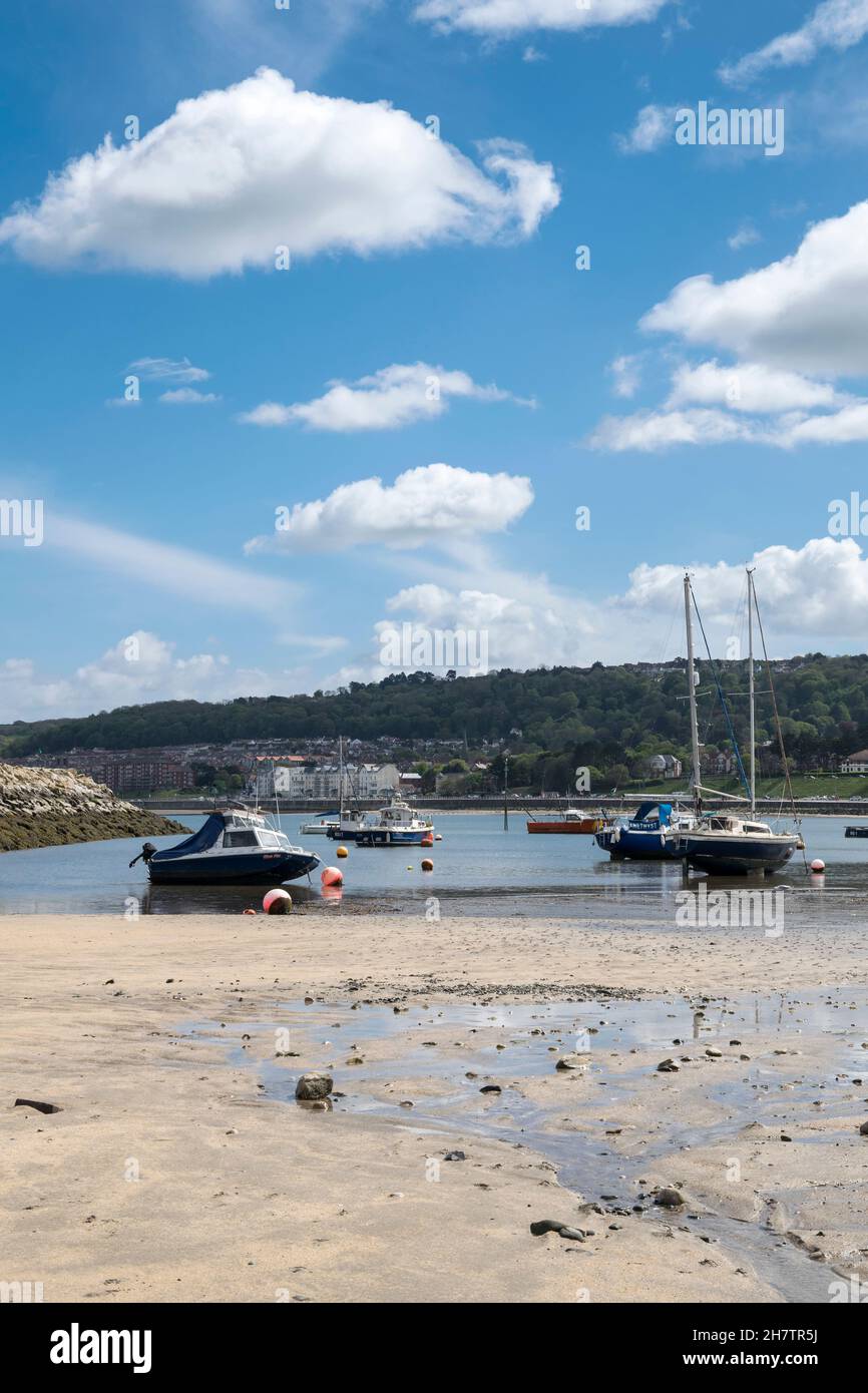 Rhos on Sea on the North Wales coast small secluded harbour with boat