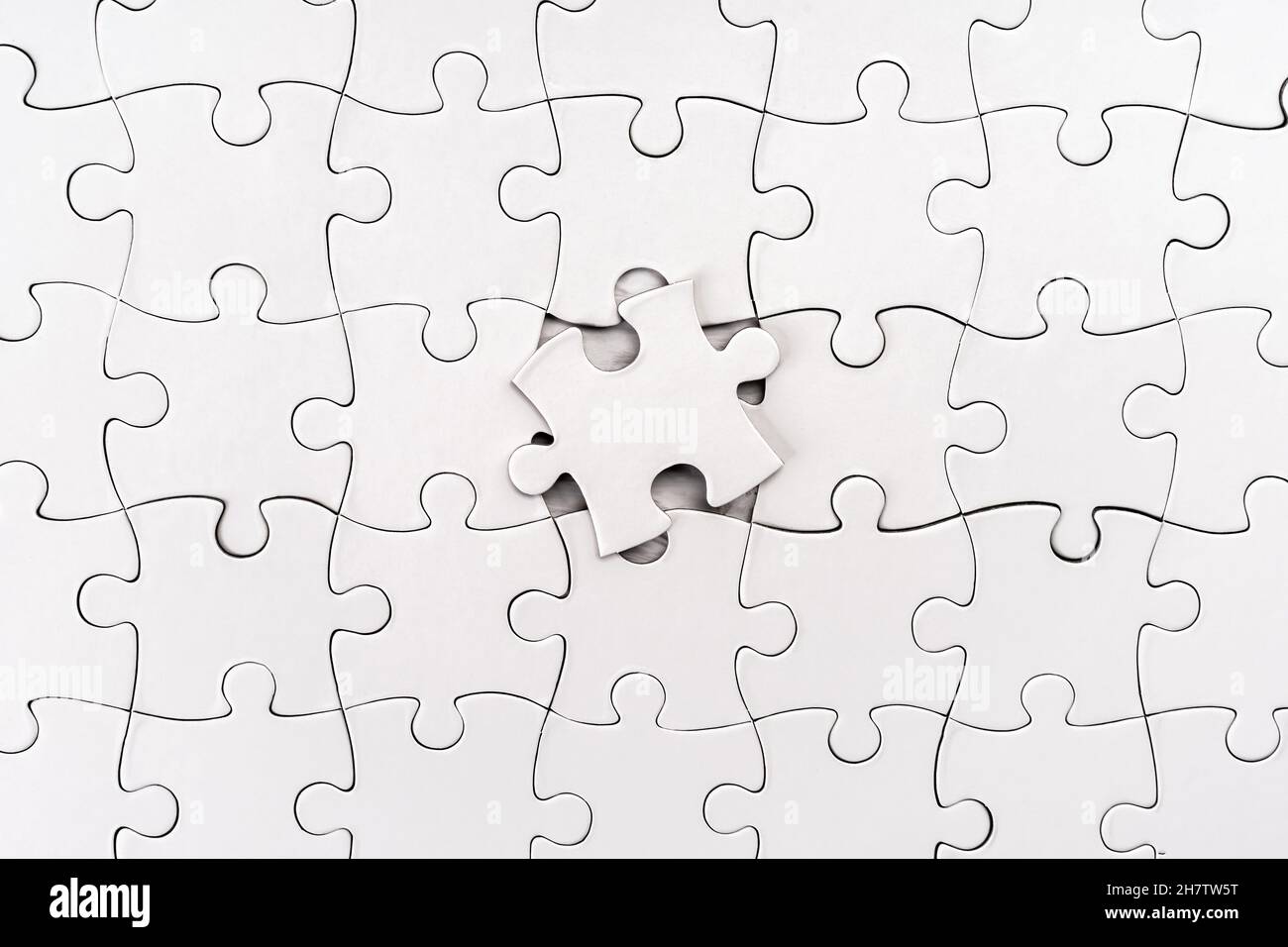 Empty jigsaw puzzle Stock Photo - Alamy